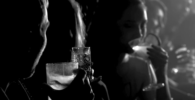 Black and White Image of People Drinking Cocktails